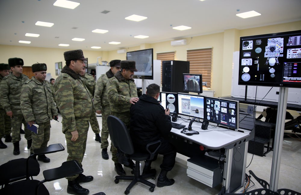 Azerbaijani defense minister checks combat capability of armored vehicles in frontline zone